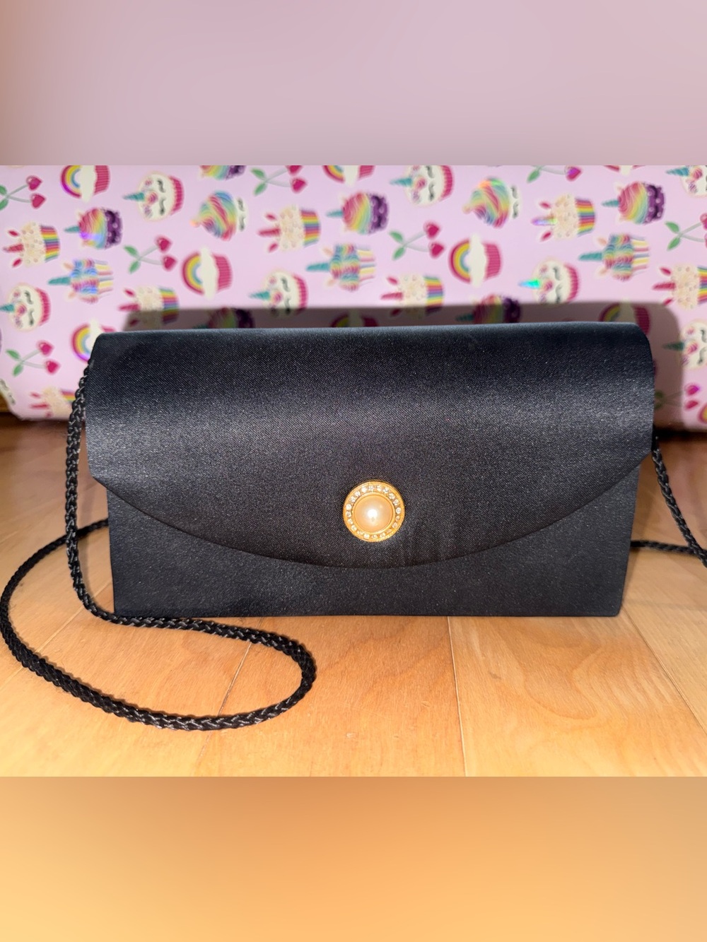 Elegant Black Satin Clutch with Pearl Accent